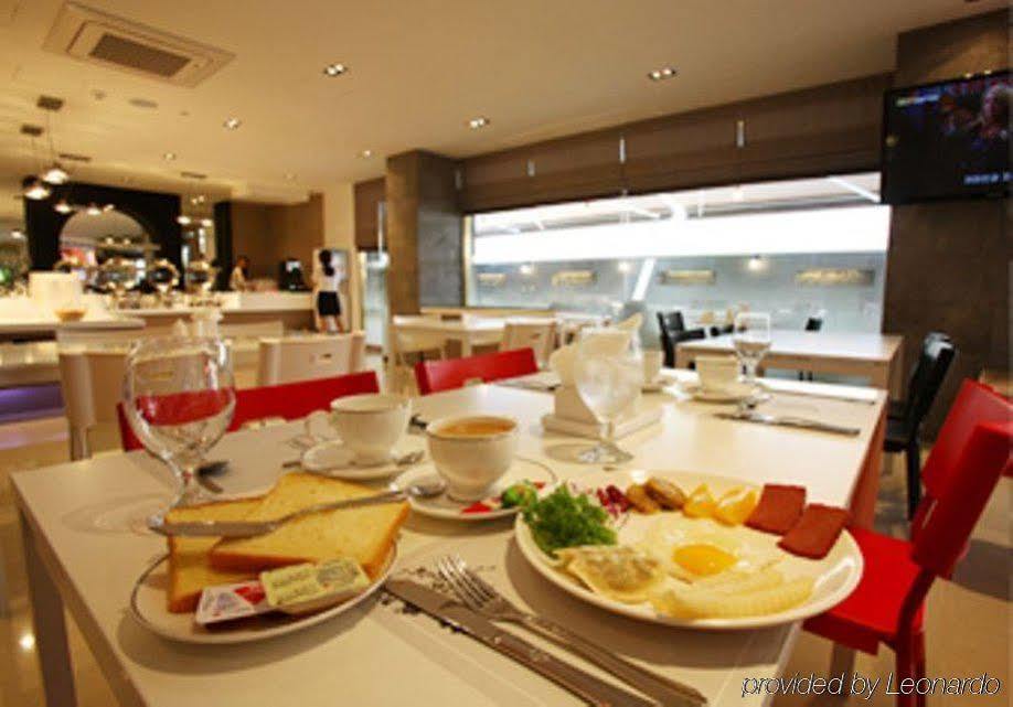 Suwon Reve Hotel Restaurante foto