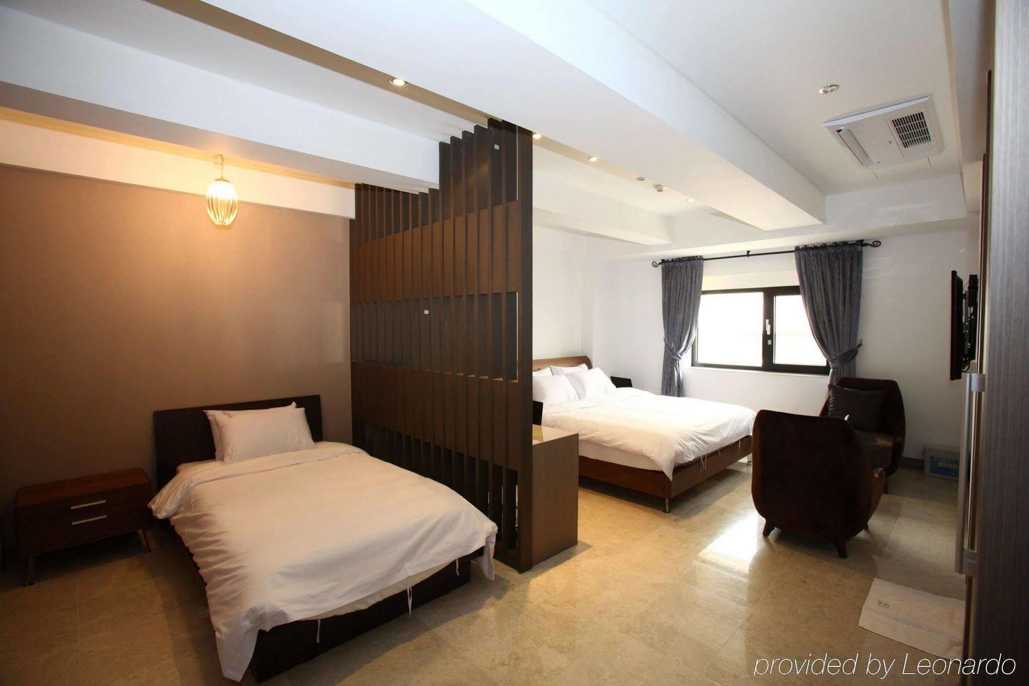 Suwon Reve Hotel Quarto foto